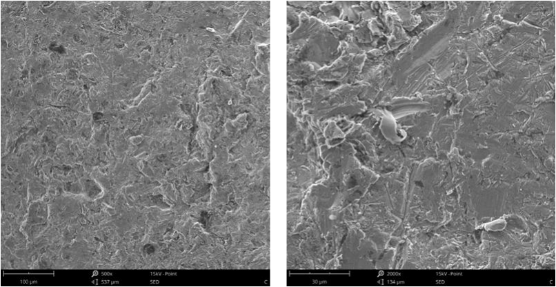 Fig.5-2 The worn surface morphology of different lining alloy steels under 4.5J impact energy (m)(n)7R 